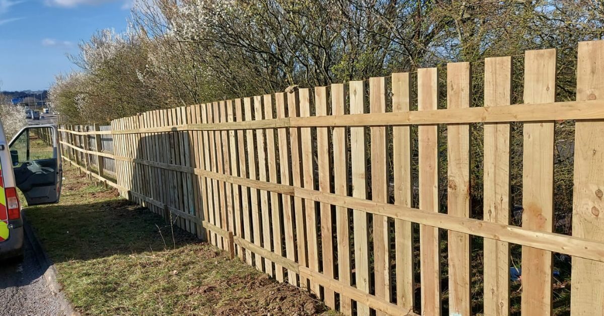 New timber post-and-rail fencing along a verge
